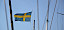 Eine schwedische Flagge auf einem Boot, Masten sichtbar - © CC0 - Pixabay - jencorchaiza